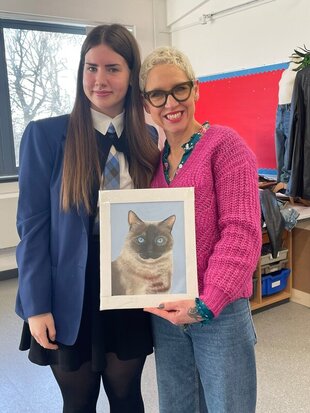 Scotland's Home of the Year TV Presenter and Interior Designer - Anna Campbell Jones - pictured with a pupil from Larbert High