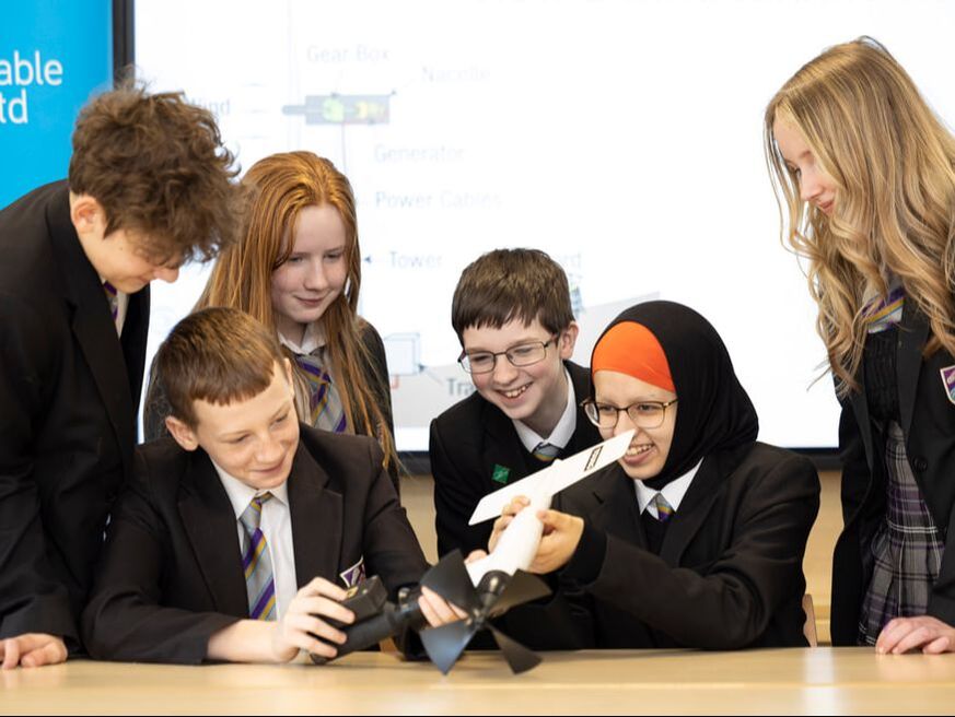 Image of young people taking part in sustainability activity
